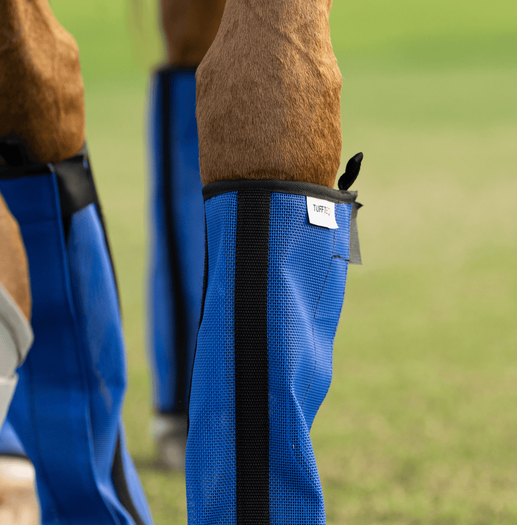 Fly boots for horses with adjustable Velcro straps and breathable design, ensuring a secure fit and cool legs during turnout, ideal for sensitive equine skin.